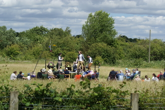 Theatre production in a meadow
